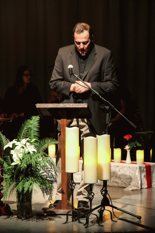 Rev. Terry Kyllo, who organized the Feb. 24 interfaith prayer service, offers a prayer of healing during the event, Tuesday, Feb. 24, 2015, in Marysville, WA. (Tulalip News/ Brandi N. Montreuil)