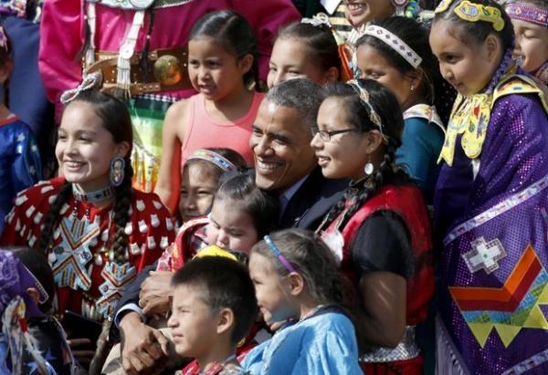 Associated PressPresident Barack Obama poses with Native America dancers during his visit to the Standing Rock Indian Reservation Friday, June 13, 2014, photo in Cannon Ball, North Dakota.