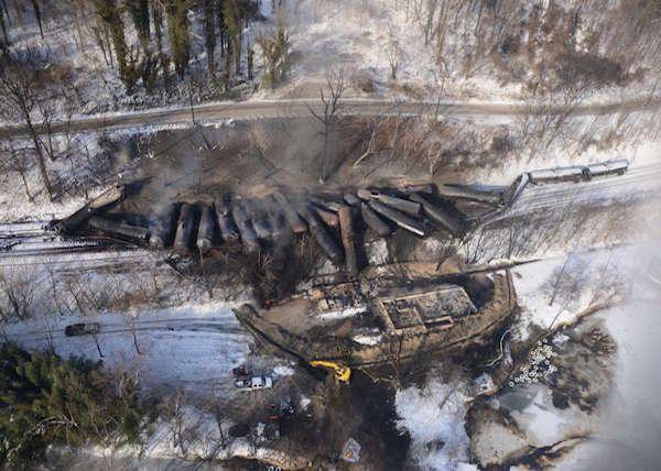 Chief Petty Officer Angie Vallier/U.S. Coast Guard photo via Popular ScienceThe derailed train cars in West Virginia, still smoldering a day later.