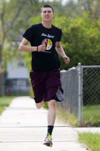 James Pine, 23, goes on a run Friday afternoon in his southwest Rapid City neighborhood. Pine has been awarded a $10,000 grant to start a youth fitness camp this summer called Lakota Forever Running and Fitness in each of the eight districts of the Pine Ridge Indian Reservation. (Josh Morgan, Journal staff)