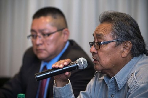 Leigh Kuwanwisiwma, right, director of the Hopi Tribe's Cultural Preservation Office, answers a question during a news conference on the Paris auctions selling Hopi sacred objects as Hopi Chief Ranger Ronald Honyumptewa looks on Wednesday, May 27, 2015 at the Heard Museum in Phoenix. Hopi tribal leaders and Arizonaâ€™s members of Congress are asking U.S. law enforcement to stop the sale of about a dozen sacred Hopi artifacts at a Paris auction house in June. (Mark Henle/The Arizona Republic via AP) MARICOPA COUNTY OUT; MAGS OUT; NO SALES; MANDATORY CREDIT