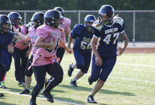 Tulalip tribal member Mytyl Hernandez known for her speed is in her second season with the Marysville Powderpuff Football Team. Photo/ Tulalip News, Brandi N. Montreuil 