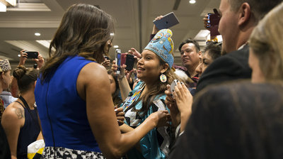 Obama embraces Deandra Antonio, 17, of Whiteriver, Ariz., after her speech.Jacquelyn Martin/AP