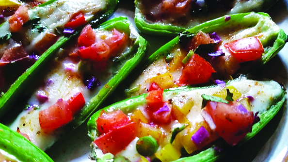 Slice the jalapenos in half lengthwise and seed them. Fill each with a small rectangle of pepper jack cheese, top with pico de gallo and sprinkle with fajita seasoning and toss on the grill.