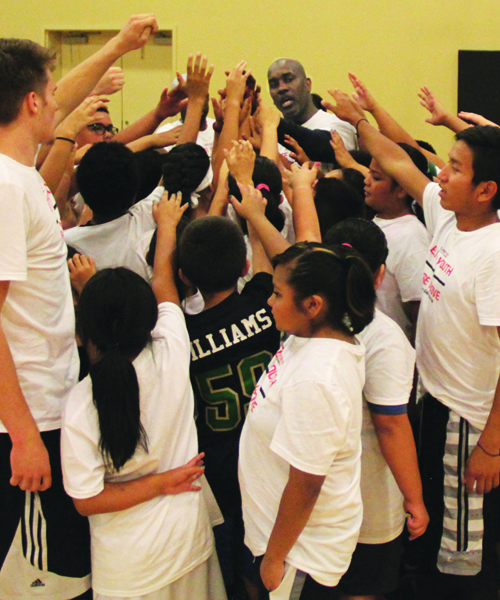 Gary Payton with Native  youth during basketball camp.Photo/Micheal Rios 