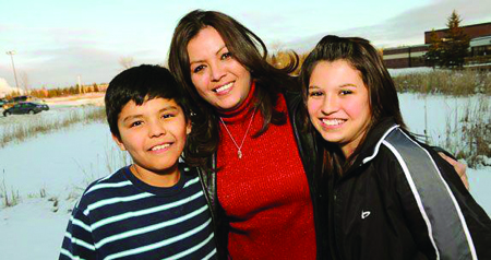 Robin Poor Bear, Oglala, and her two children Anthony and Darian appeared in the PBS series, “Kind Hearted Woman.”  Photo/PBS.org
