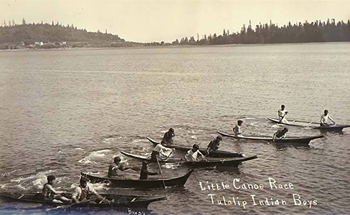 Above: Little canoe race, Tulalip Indian boys, ca. 1912. Photographer: Ferdinand Brady