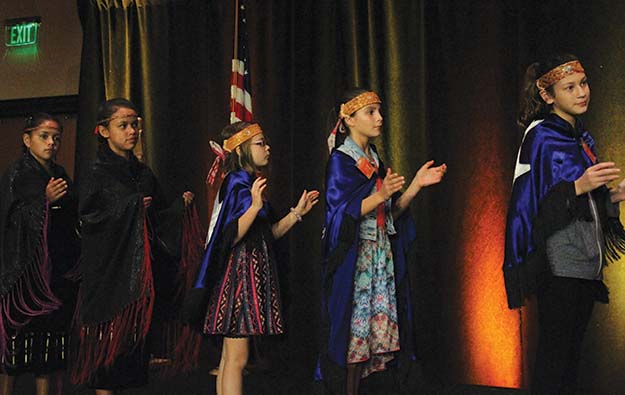 Tulalip youth open the Raising Hands Ceremony with a welcoming song.